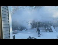 Man throw hot water to air winter backyard