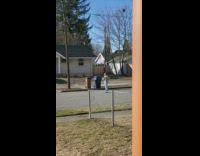 Girl renegade dance phone on trash can bin