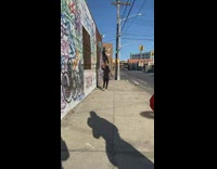 Human tower on sidewalk 