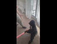 Little boy in black robe with red lightsaber yelling step up kyle 