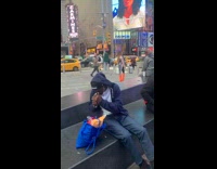 Woman in transparent coat modeled on the streets