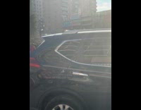 Old man on mobility scooter sing street