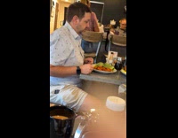 Man waits for woman to film food