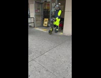 Guy walking out of store with maximum covid protection