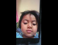 Little girl video selfie no front teeth