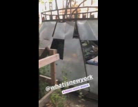 Metal armor spaceship car with gun parked on the street