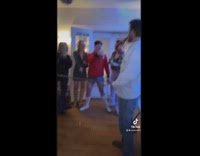 Guy holding beer cans plays limbo fail 