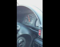 Person drive car with broken dashboard speedometer