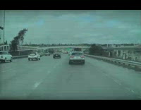 Blue car swerves hits car on road