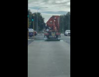 Floating truck spotted drives on the road
