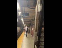 Rain water pouring from subway station ceiling