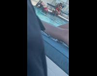 Woman poses in the pool 