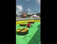 Kid gets knocked over rotating moving bars 