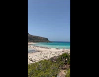 Two Blue Seas Intersect Between Shallow Beach