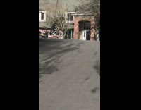 Three men bicycle orange cart subdivision