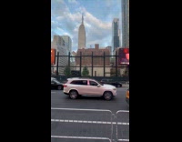 Bouncy white SUV on the street