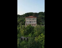 Man Steers Aerial Drone Around Abandoned Mansion