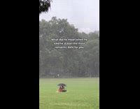 Couple on romantic date under the rain