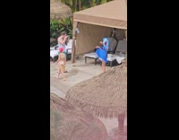 Woman bikini with Burqa poses at resort