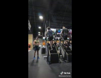 Guy hops on gymmaster with random guy 