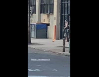 Object burns in middle of sidewalk 