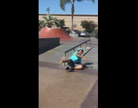 Skater falls off railing