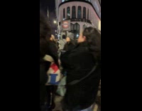 Time lapse long line of people night street