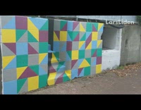 Guy shows optical illusion geometric mural stairs 