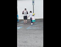 Collab winy - Young girl carry large doll plushy parking lot