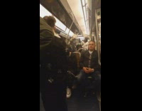 People inside the subway sings loud and happy