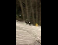 Guy on snowboard falls and does scorpion 