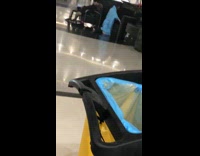 People sleep on chairs in airport