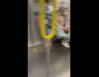 Two little kids on subway having dance battle