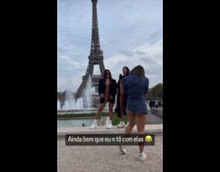 Two women in bikini stopped by the police with the Eiffel Tower behind