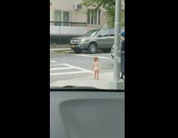 Woman lets her baby walk around naked nude on sidewalk