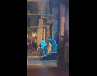 Man rap video shoot with a blue light