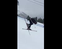 Ski jump fail black helmet slow motion 