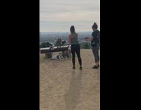 Woman shout dogs sit bench canyon overlooking
