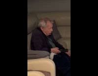 Grandpa falling asleep while sitting on couch