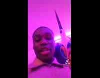 Guy uses scissors to flip chicken in dorm