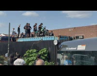 Guy lets motorbike fall off cargo 