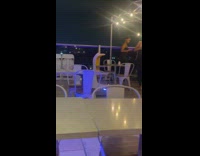 White robot serves at restaurant 