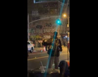 Collab WINY - Man blows bubbles on street 