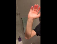 Man shows moving nerves on his arm 