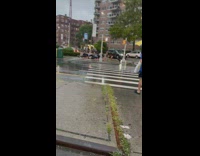 Group of men hold plank in rain