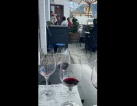 Girl wears beret and red dress restaurant 