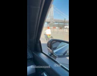 Random person rides tribike in the highway