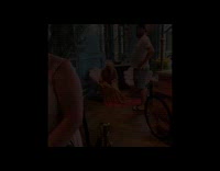 Man takes picture of woman yellow dress and reviews it