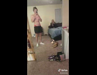 Guy wears girlfriends red underwear under shorts