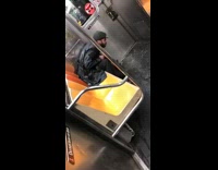 Man bends over and throws up on subway train